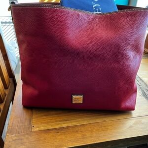 Large Dooney and Bourke pebble leather bag.